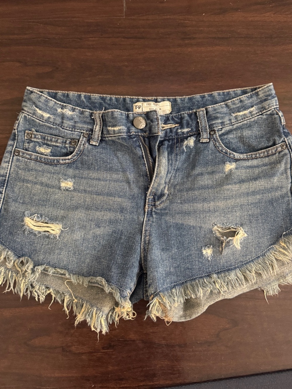 Free People Distressed Light Blue Denim Cutoff Shorts